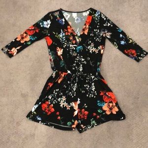 Black and floral romper